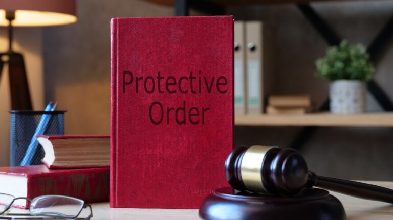Protective Order book and judge gavel