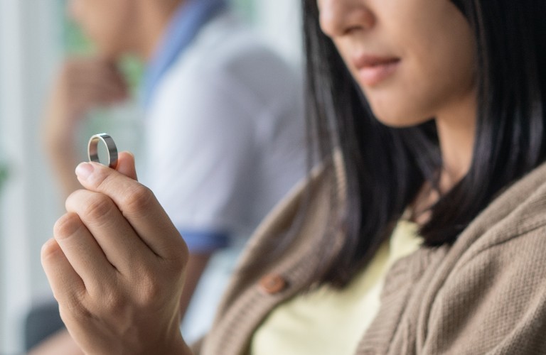 wife looking at wedding ring