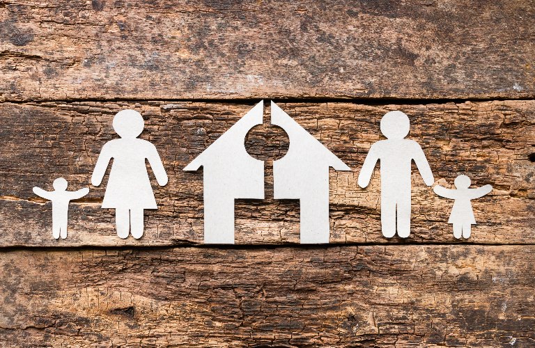 paper family and a cut house