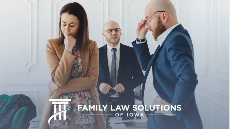 Three professionally dressed individuals in a serious discussion in a bright office, with "Family Law Solutions of Iowa" text.